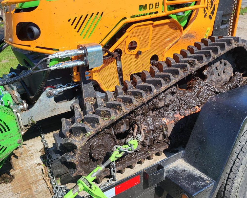 Wooded acreage cleared with a low ground pressure tracked mower